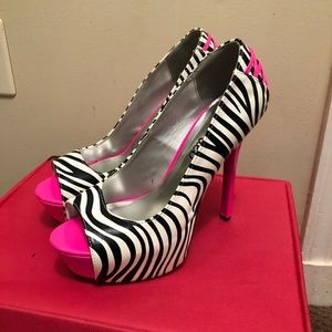 Zebra print with hot pink accent heels